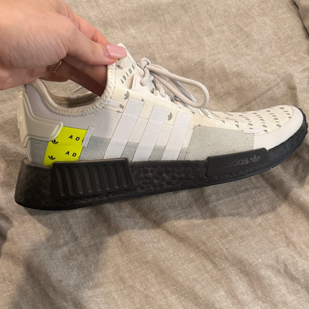 Like brand new!!!  Adidas NMD R1 White and Black with Yellow Detail